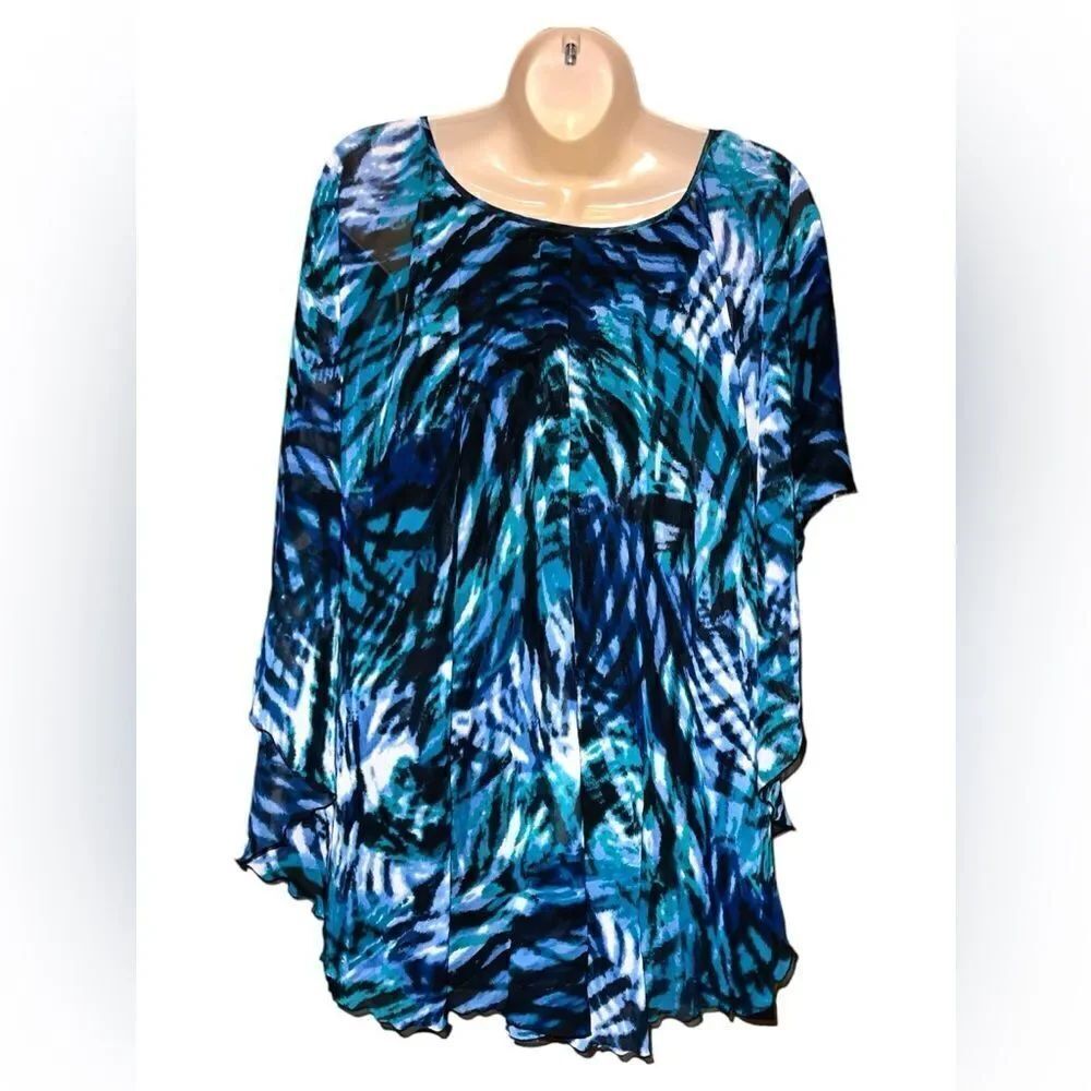 CATO Women Plus Overlay Sleeveless V-Neckl ruffled and straight hemline hips.